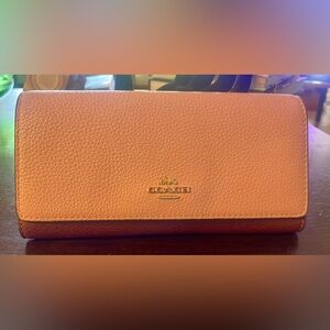 Coach leather wallet. Two-tone, pink and burgundy.